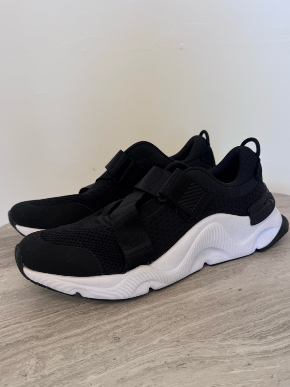 Sorel Black Slip-On Athletic Shoe with White Logo